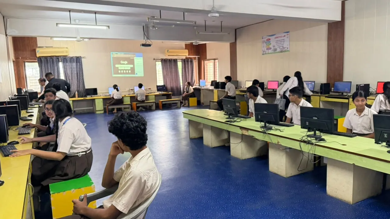 School student cohort engaged in career exploration and digital assessment in school computer lab
